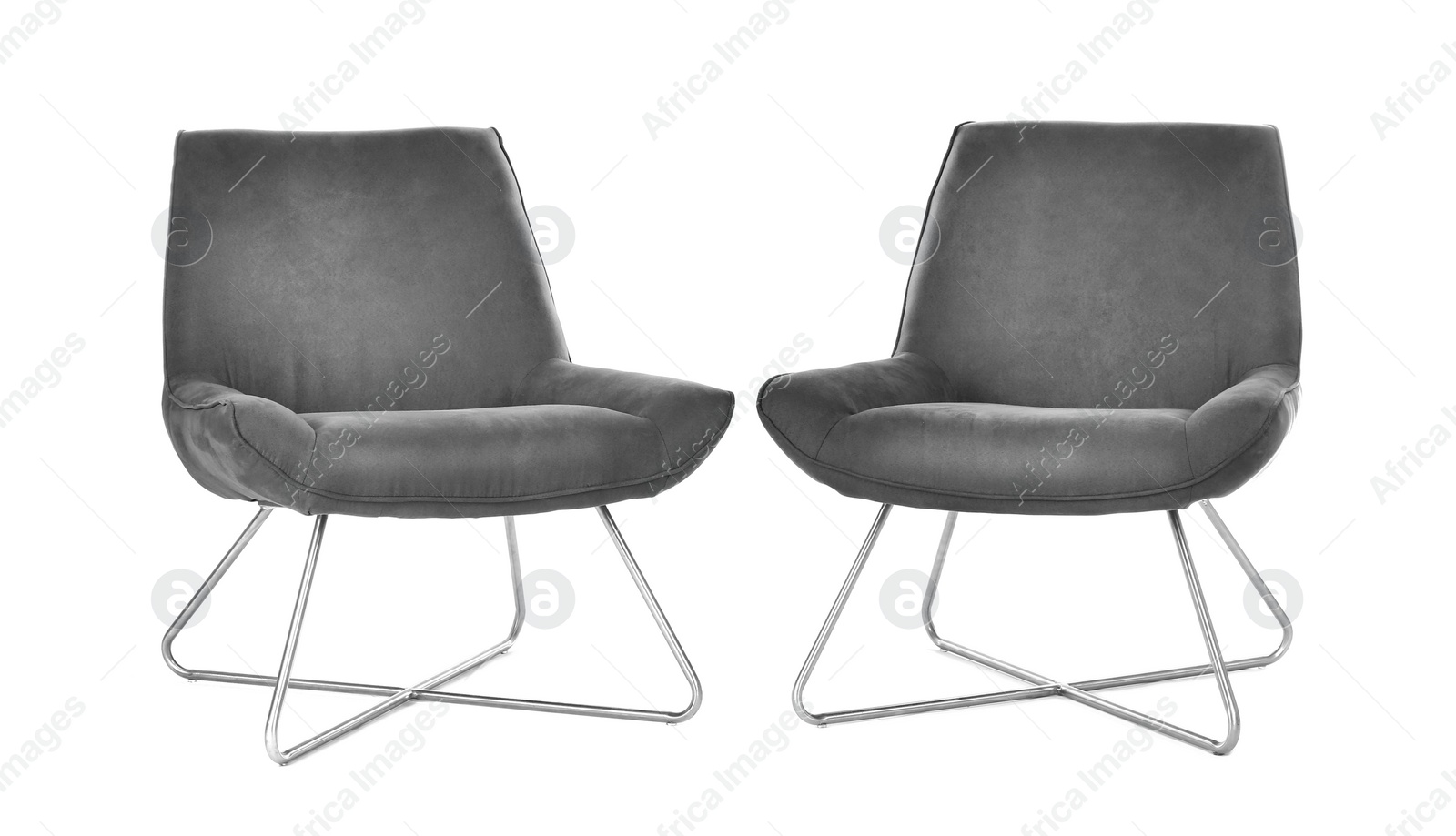 Photo of Comfortable armchairs isolated on white. Interior element