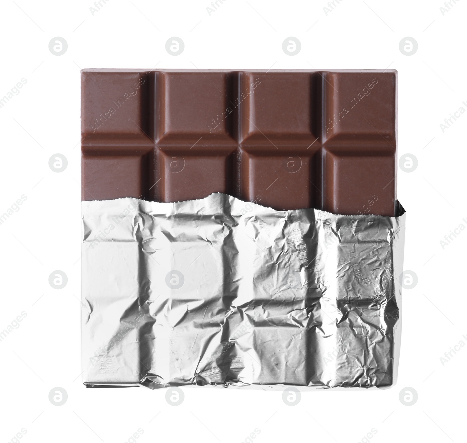 Photo of Delicious milk chocolate bar wrapped in foil isolated on white