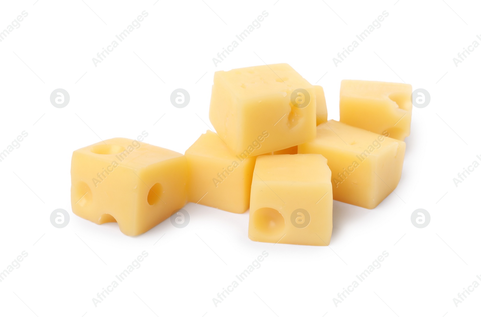 Photo of Cubes of delicious cheese isolated on white