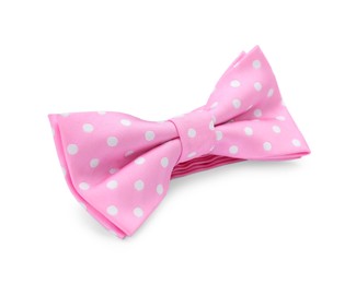 Photo of Stylish pink bow tie with polka dot pattern on white background