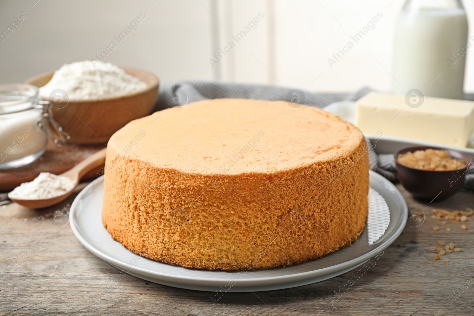 Photo of Delicious fresh homemade cake on wooden table