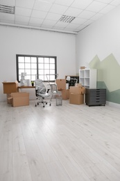 Moving boxes and furniture in new office