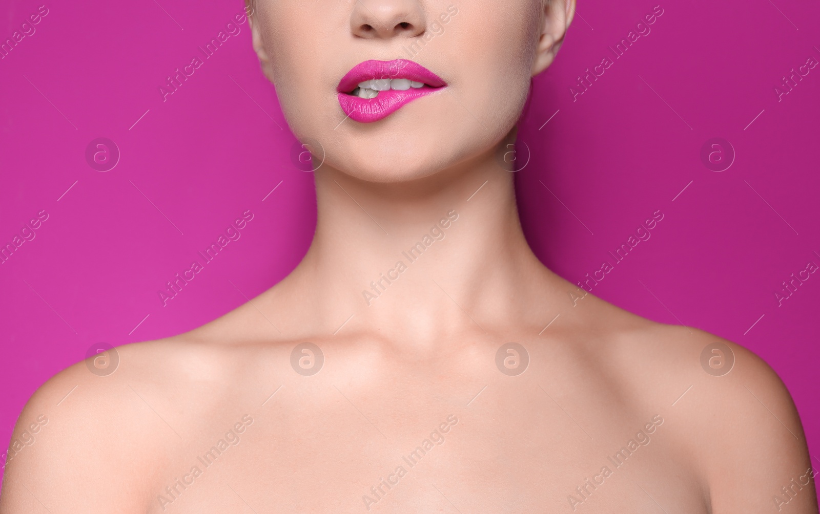 Photo of Beautiful young woman with perfect lips makeup on color background, closeup