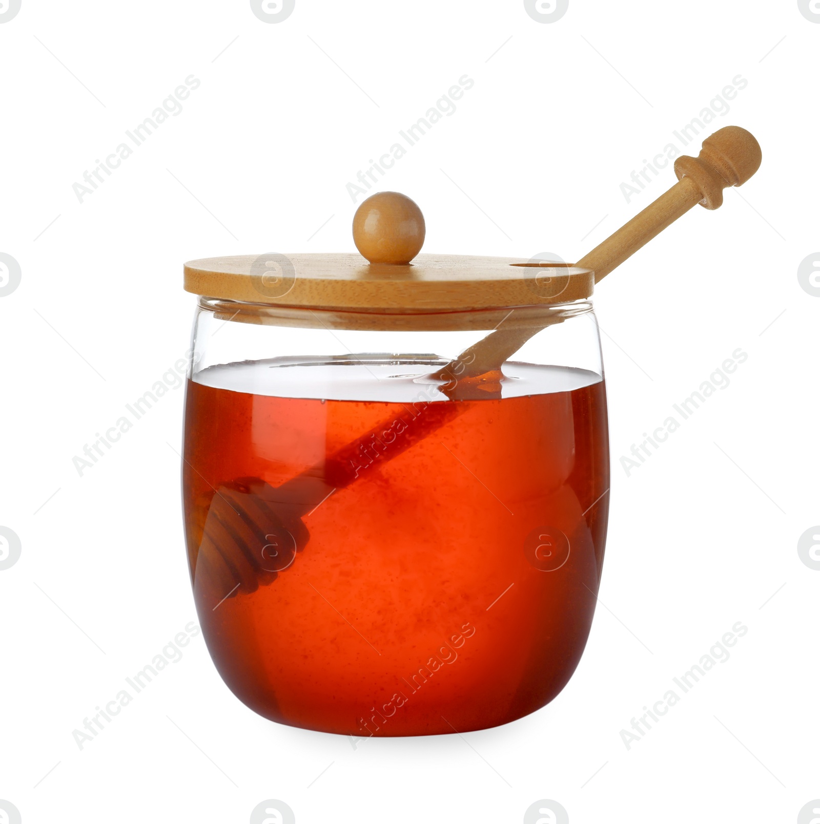 Photo of Jar with organic honey and dipper isolated on white