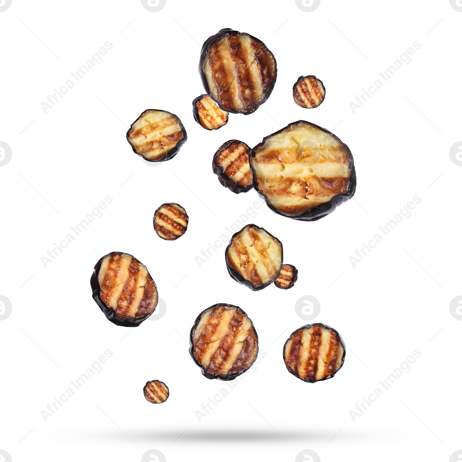 Image of Slices of grilled eggplants in air on white background