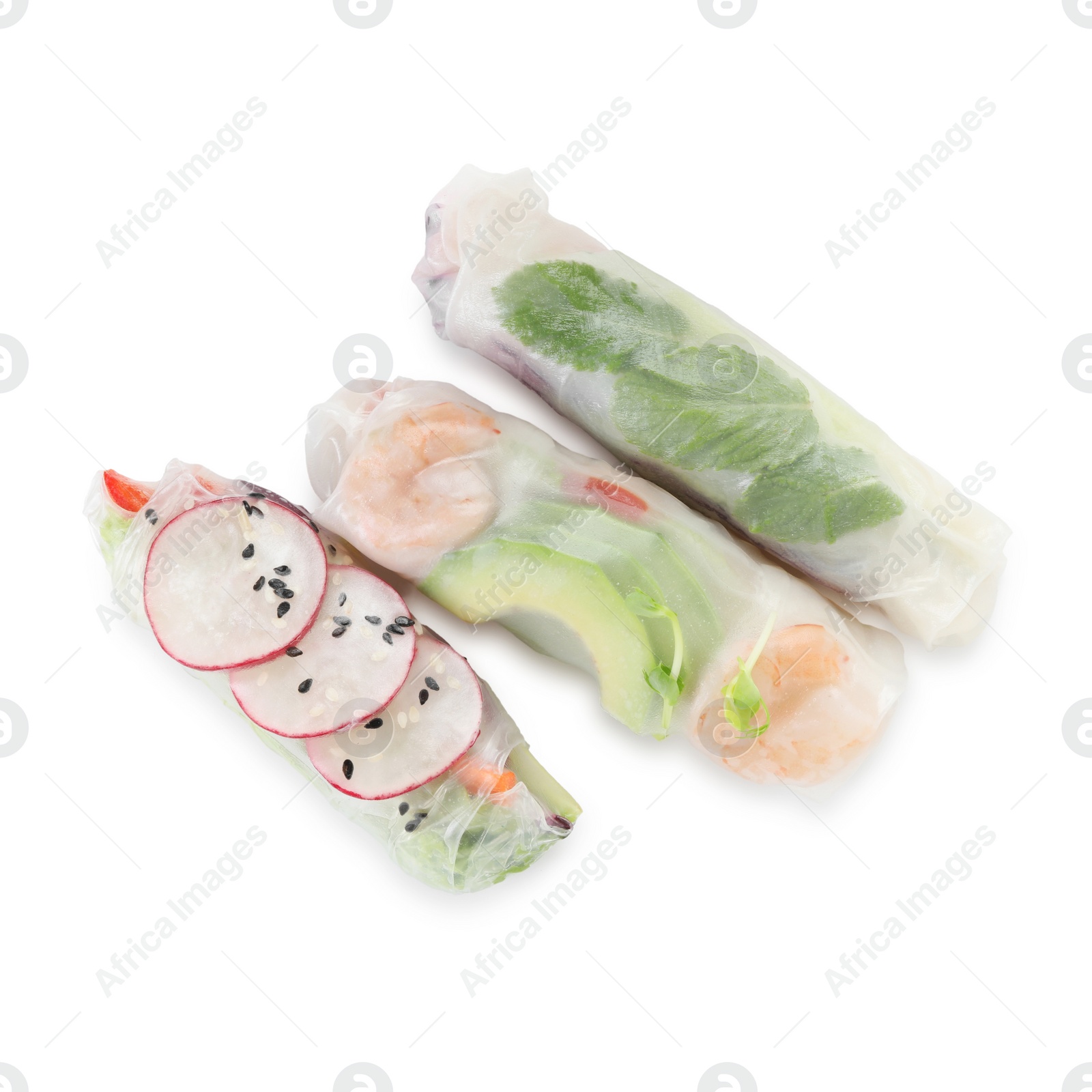 Photo of Delicious spring rolls wrapped in rice paper isolated on white, top view