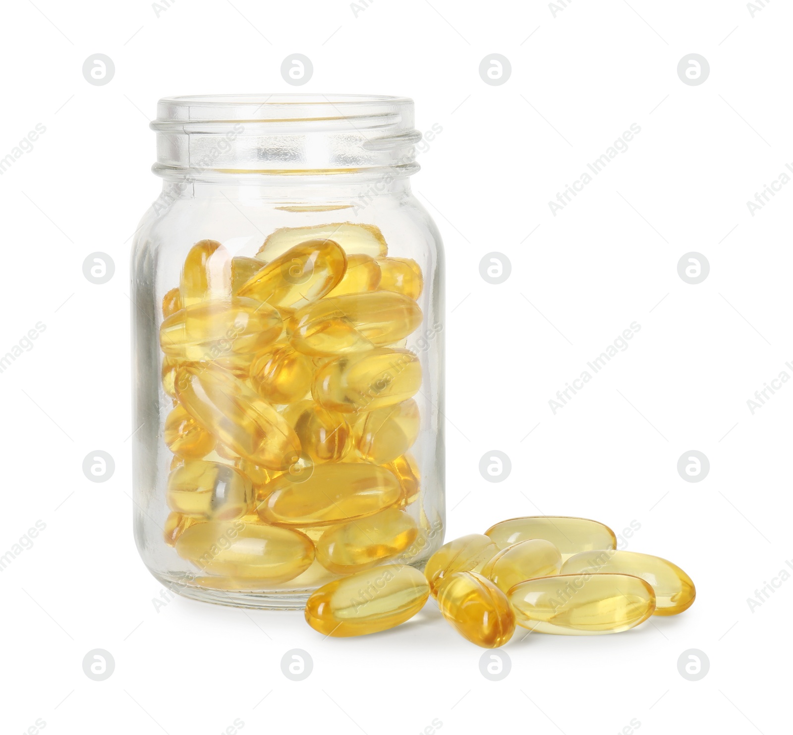 Photo of Bottle and pile of softgel capsules isolated on white