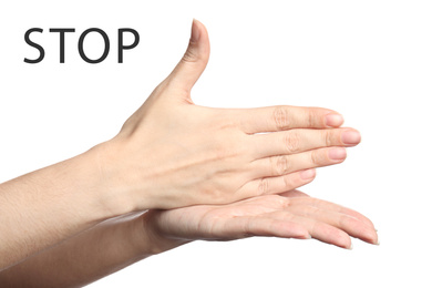 Image of Woman showing word Stop on white background, closeup. American sign language
