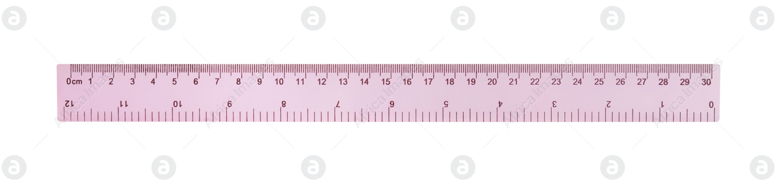 Photo of Ruler with measuring length markings in centimeters isolated on white, top view