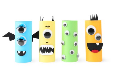 Photo of Monsters made of paper isolated on white. Halloween decoration