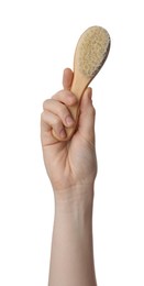 Photo of Woman holding bamboo brush on white background, closeup. Conscious consumption