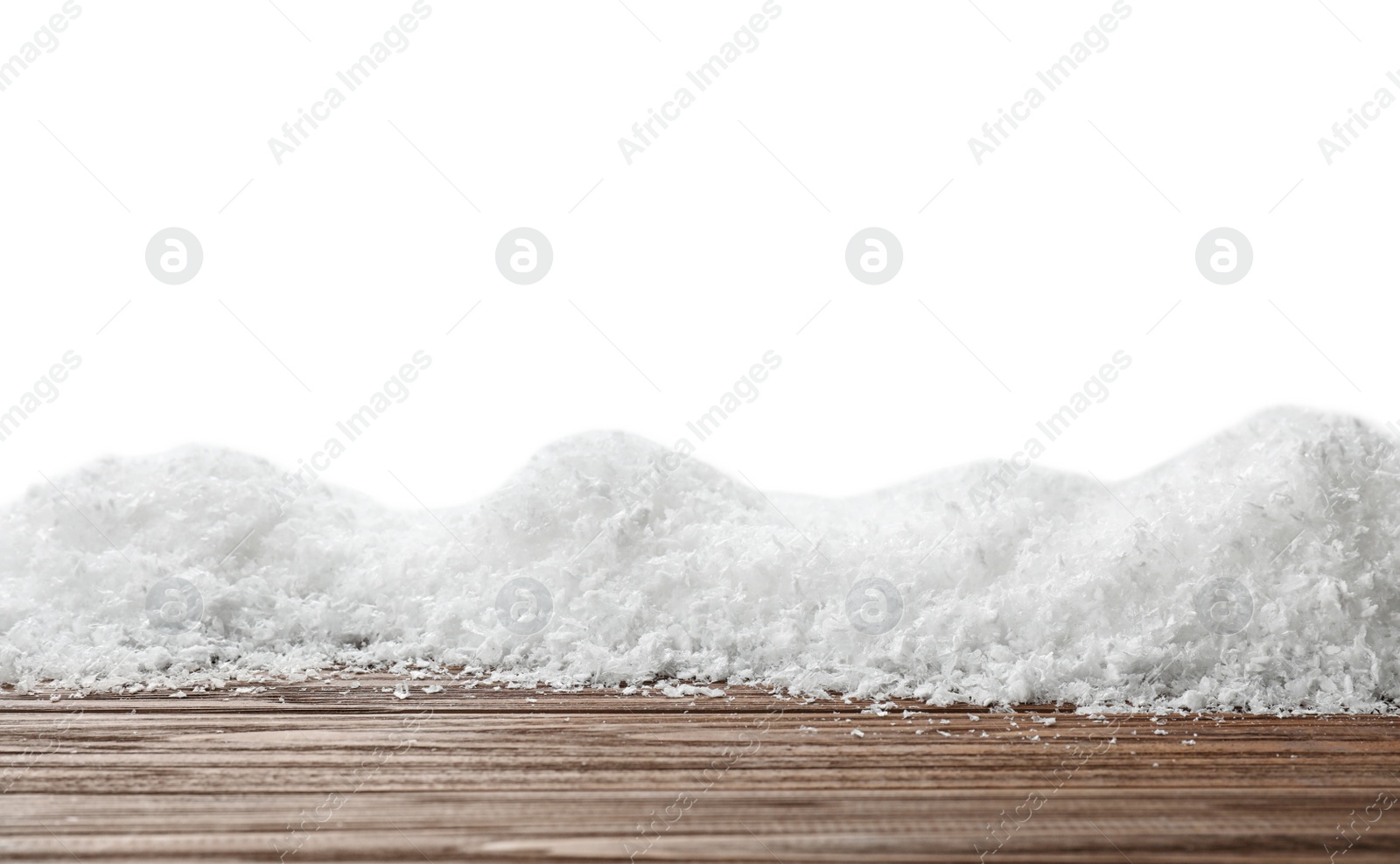Photo of Wooden surface covered with snow against white background