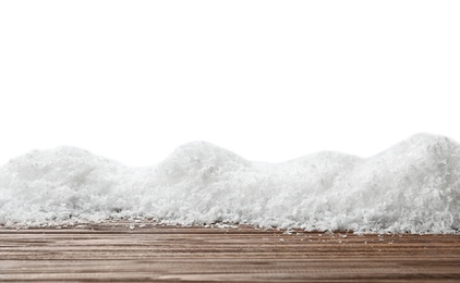 Wooden surface covered with snow against white background