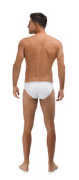 Handsome man in underwear on white background, back view