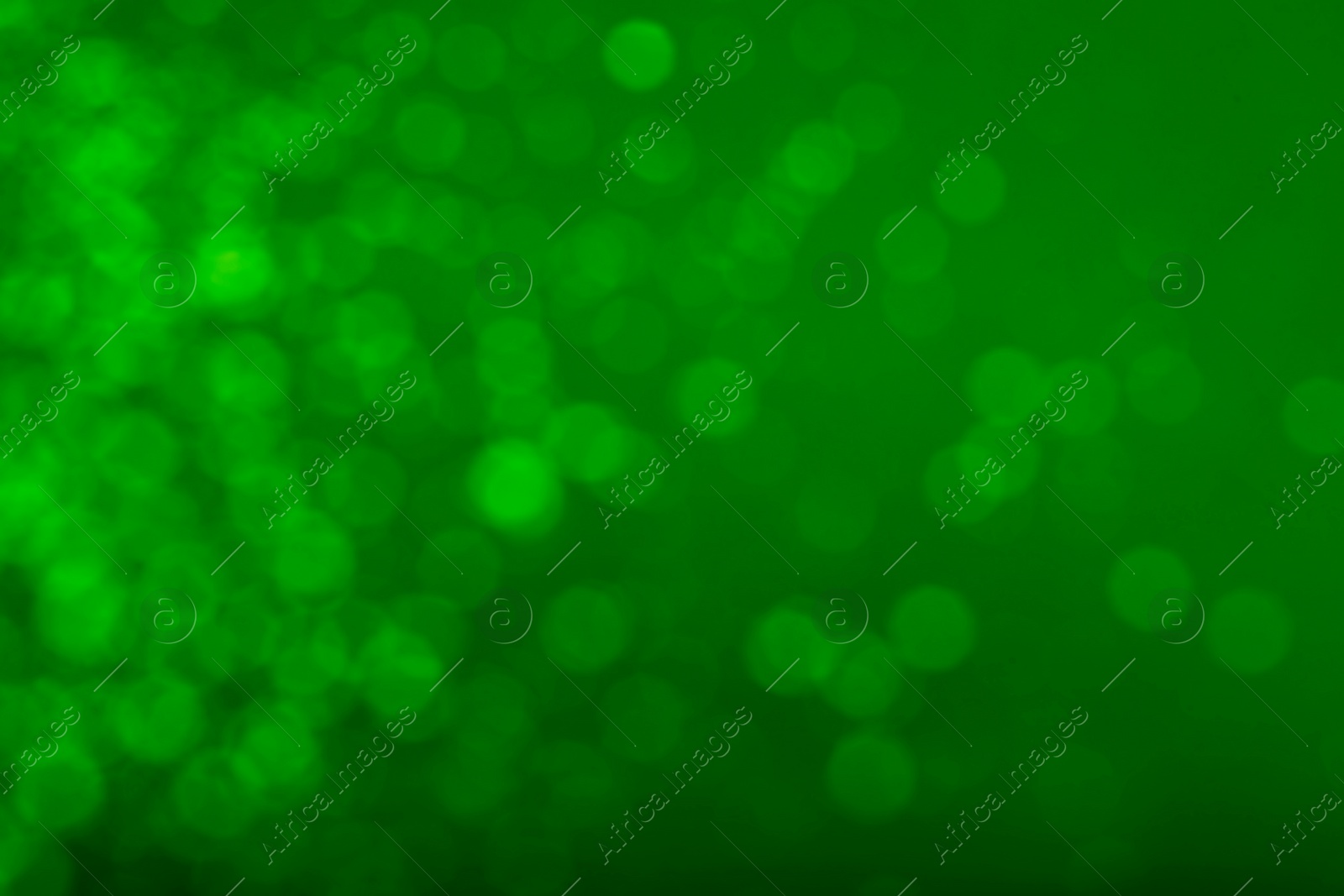 Image of St. Patrick day. Green background with blurred lights, bokeh effect