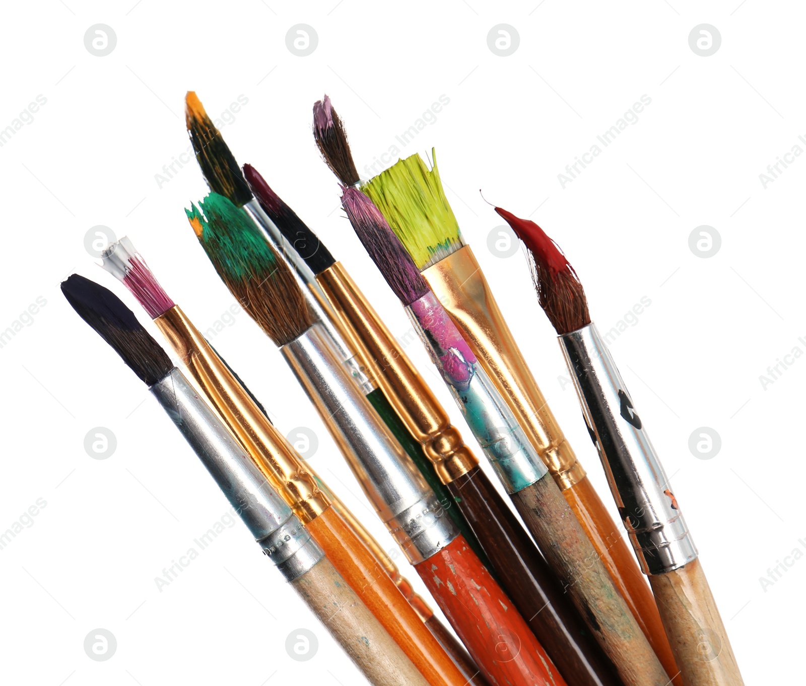 Photo of Different brushes with paints on white background