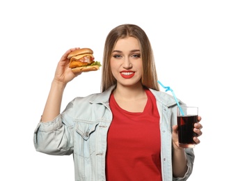 Pretty woman with tasty burger and cola isolated on white