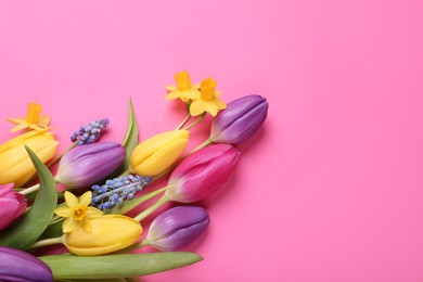 Photo of Beautiful different flowers on pink background, flat lay. Space for text