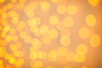 Photo of Beautiful gold lights as background. Bokeh effect