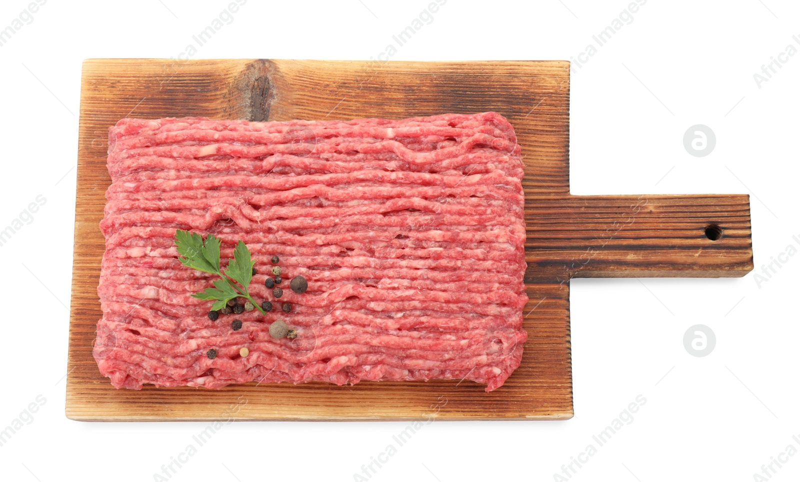 Photo of Board with raw ground meat, peppercorns and parsley isolated on white, top view