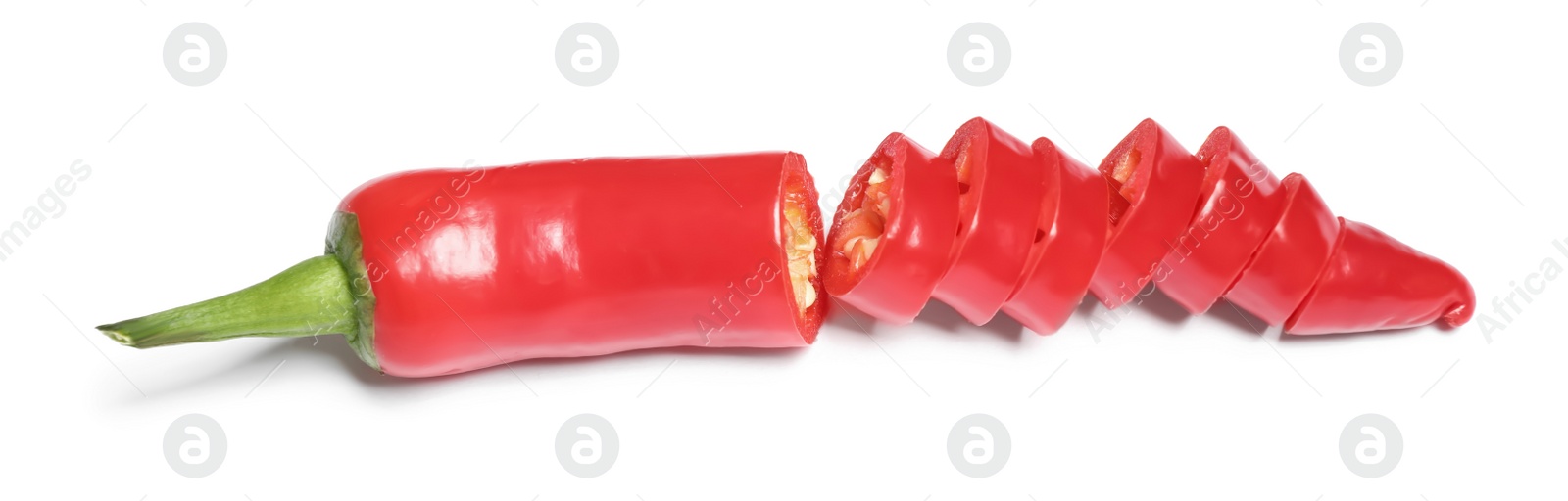 Photo of Cut red hot chili pepper on white background