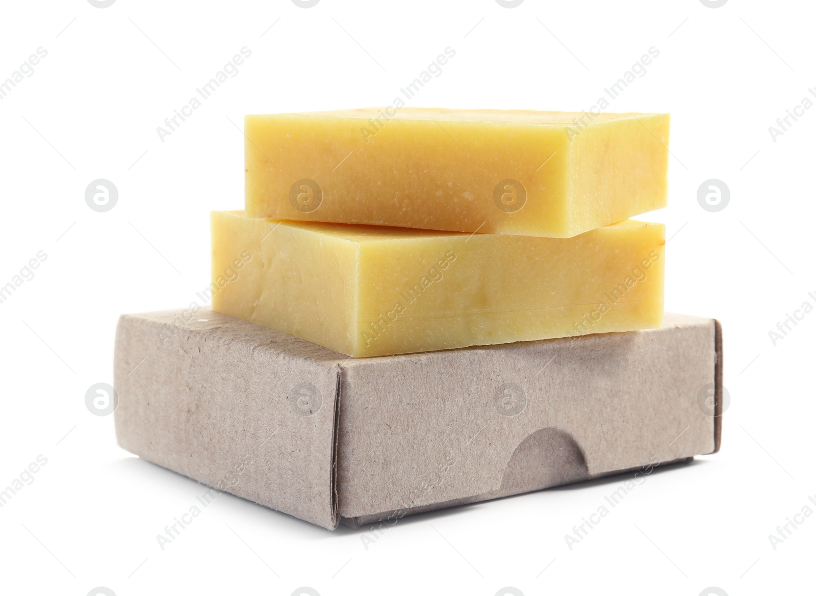 Photo of Hand made soap bars and cardboard package on white background