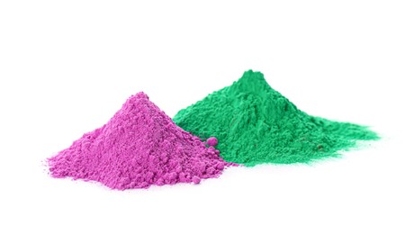 Photo of Colorful powder dyes on white background. Holi festival