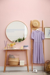 Elegant round mirror in stylish room interior
