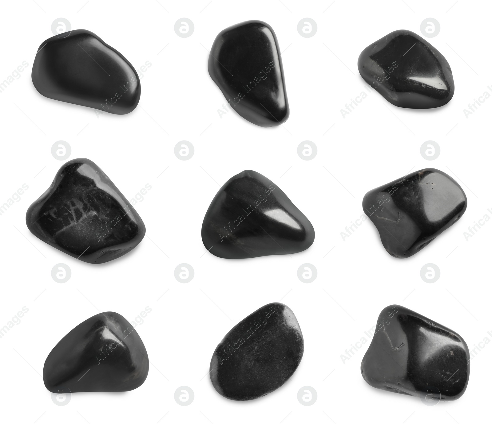 Image of Set with black spa stones on white background