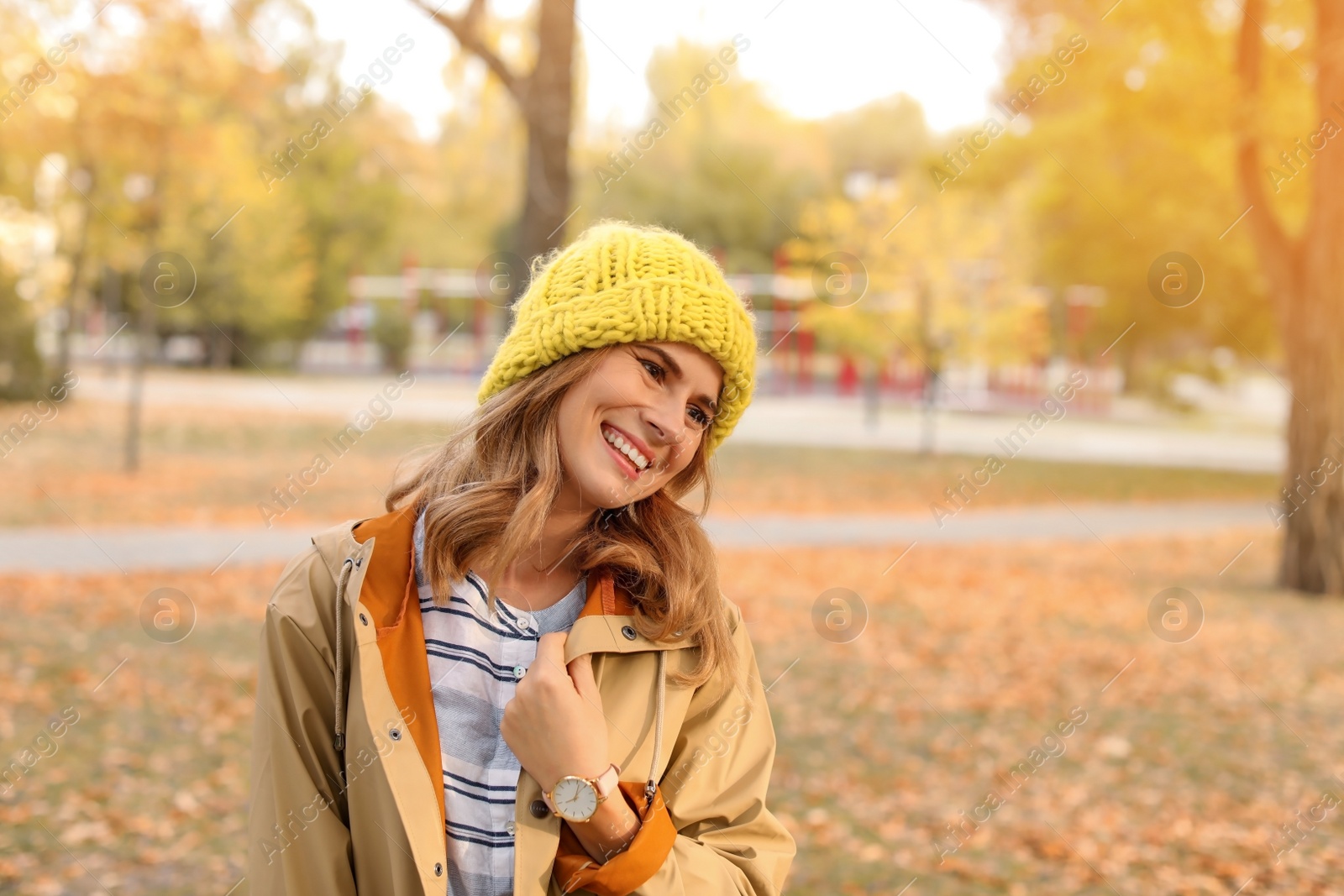 Photo of Portrait of beautiful woman in park. Autumn walk