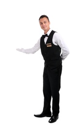 Full length portrait of young waiter in uniform on white background