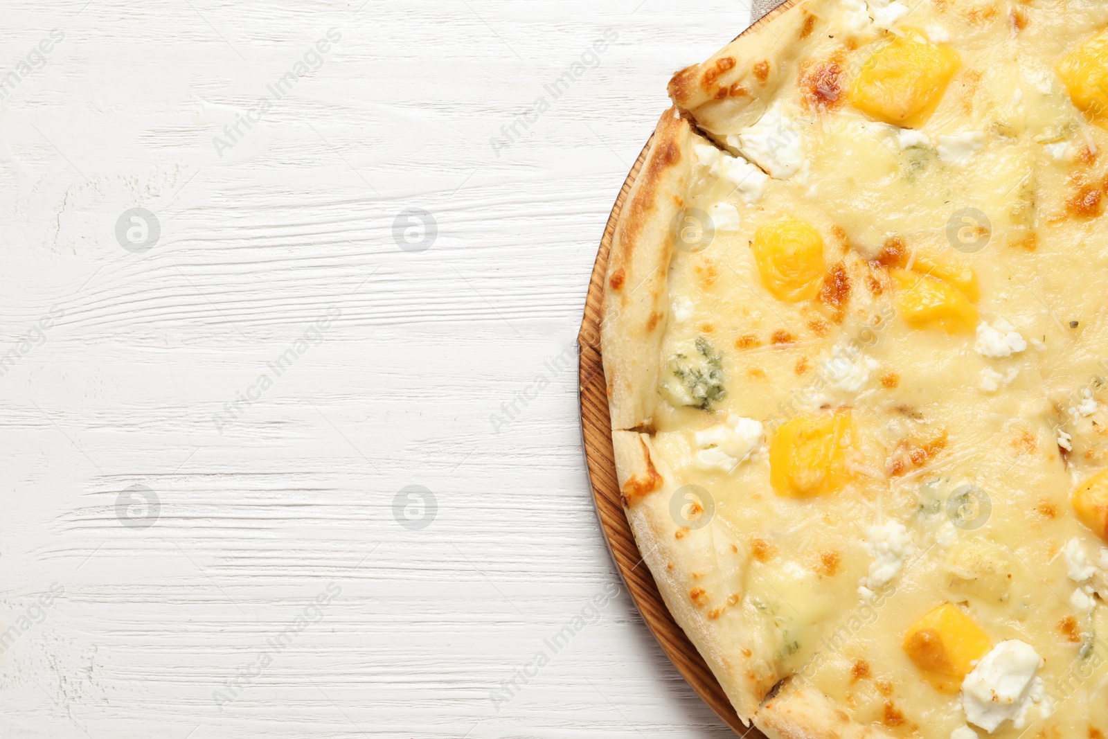 Photo of Hot cheese pizza Margherita on white wooden background, top view. Space for text