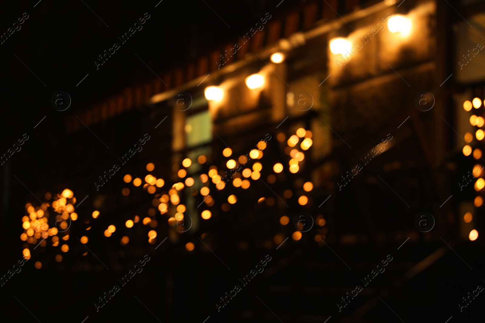 Photo of Beautiful street lights at night. Bokeh effect