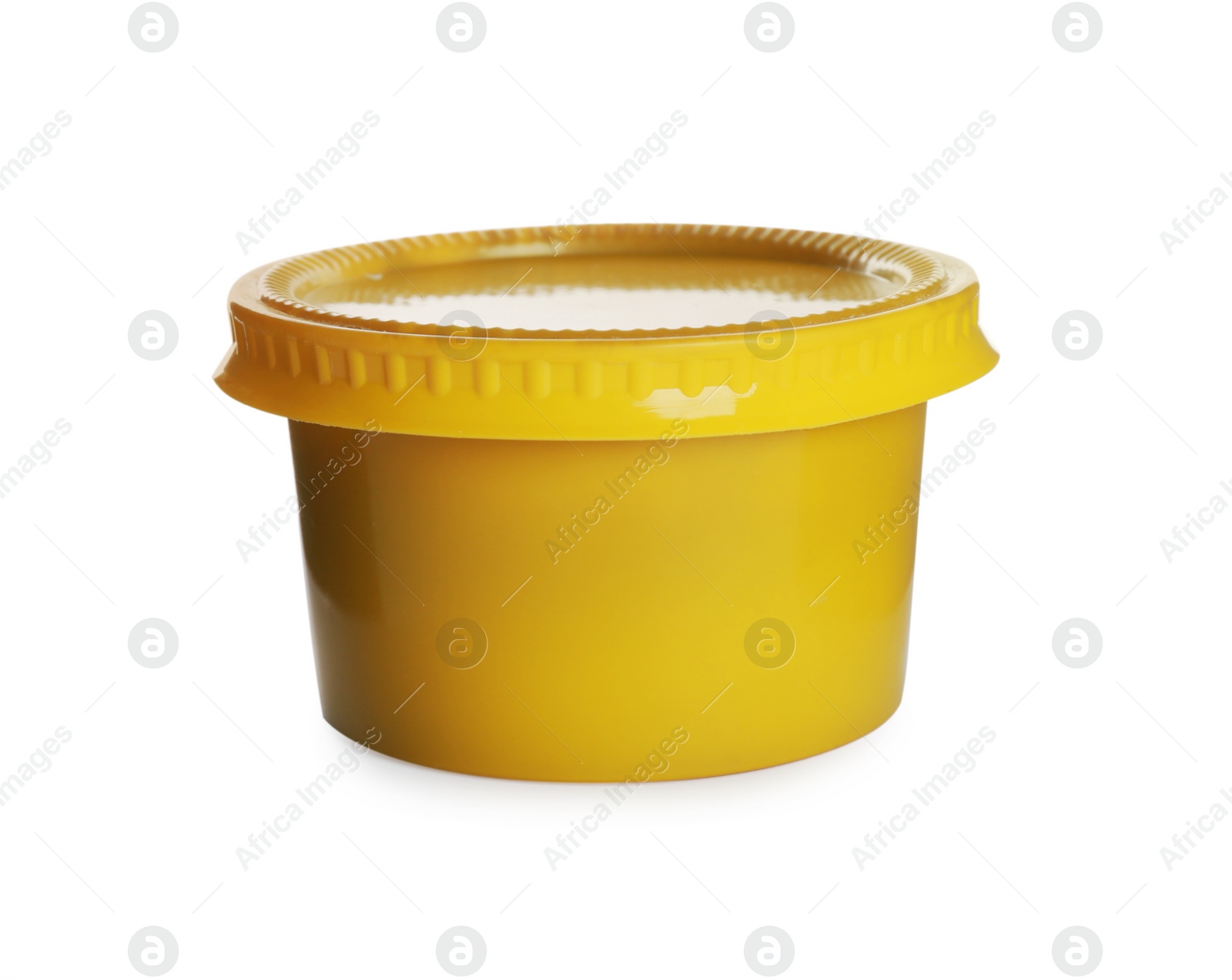 Photo of Spicy mustard in plastic container isolated on white