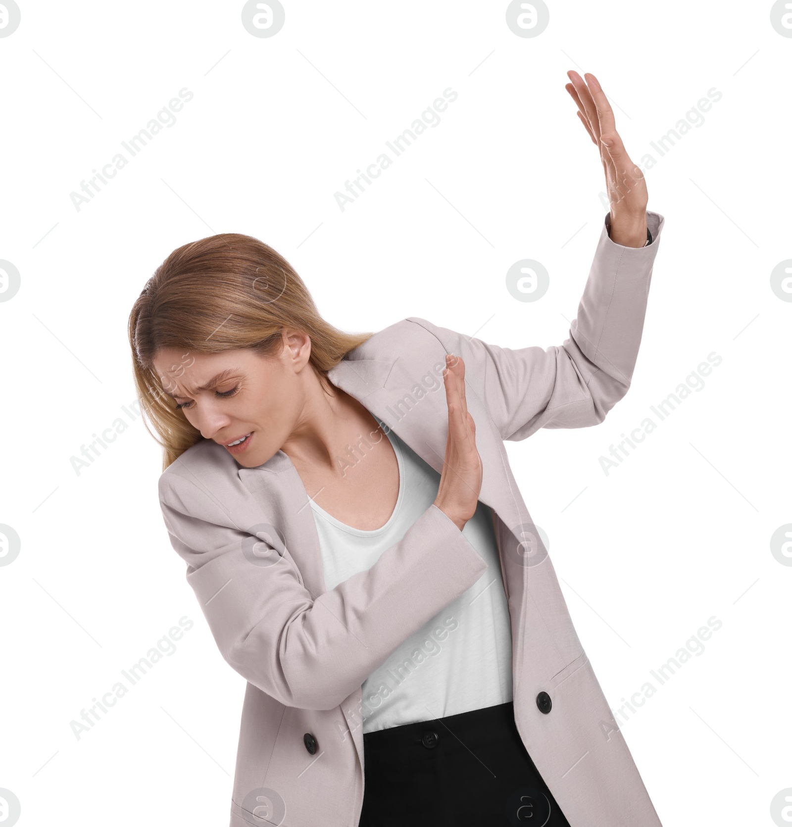 Photo of Beautiful businesswoman avoiding something on white background