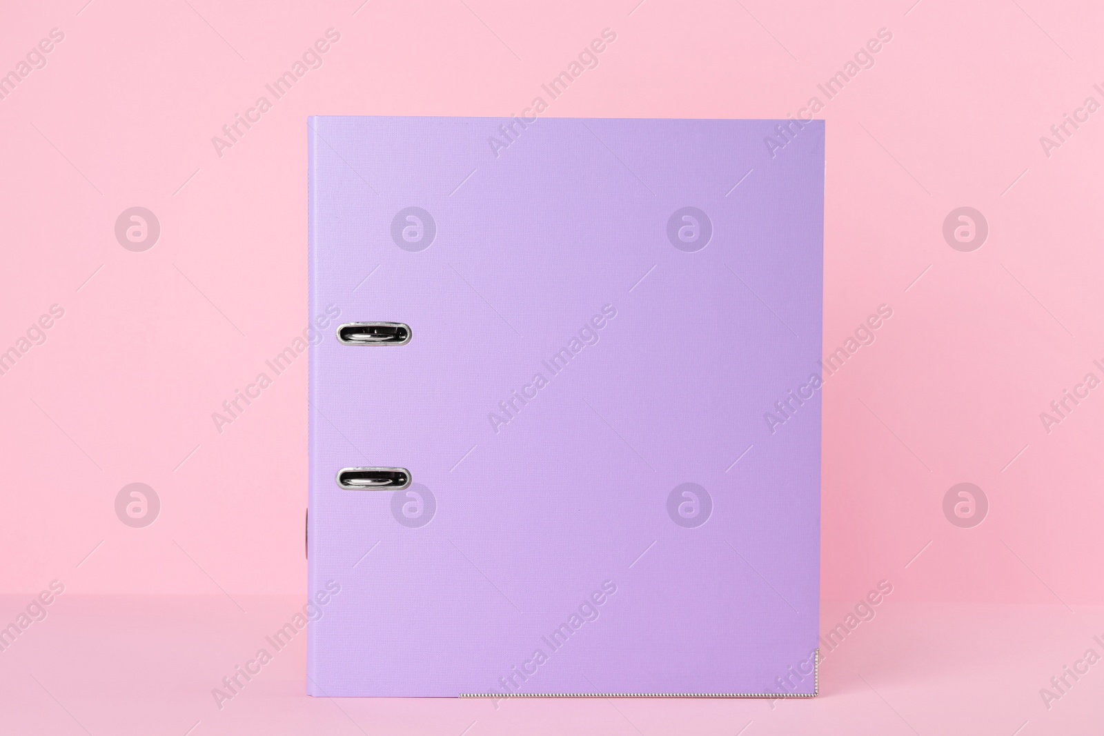 Photo of Lilac hardcover office folder on pink background