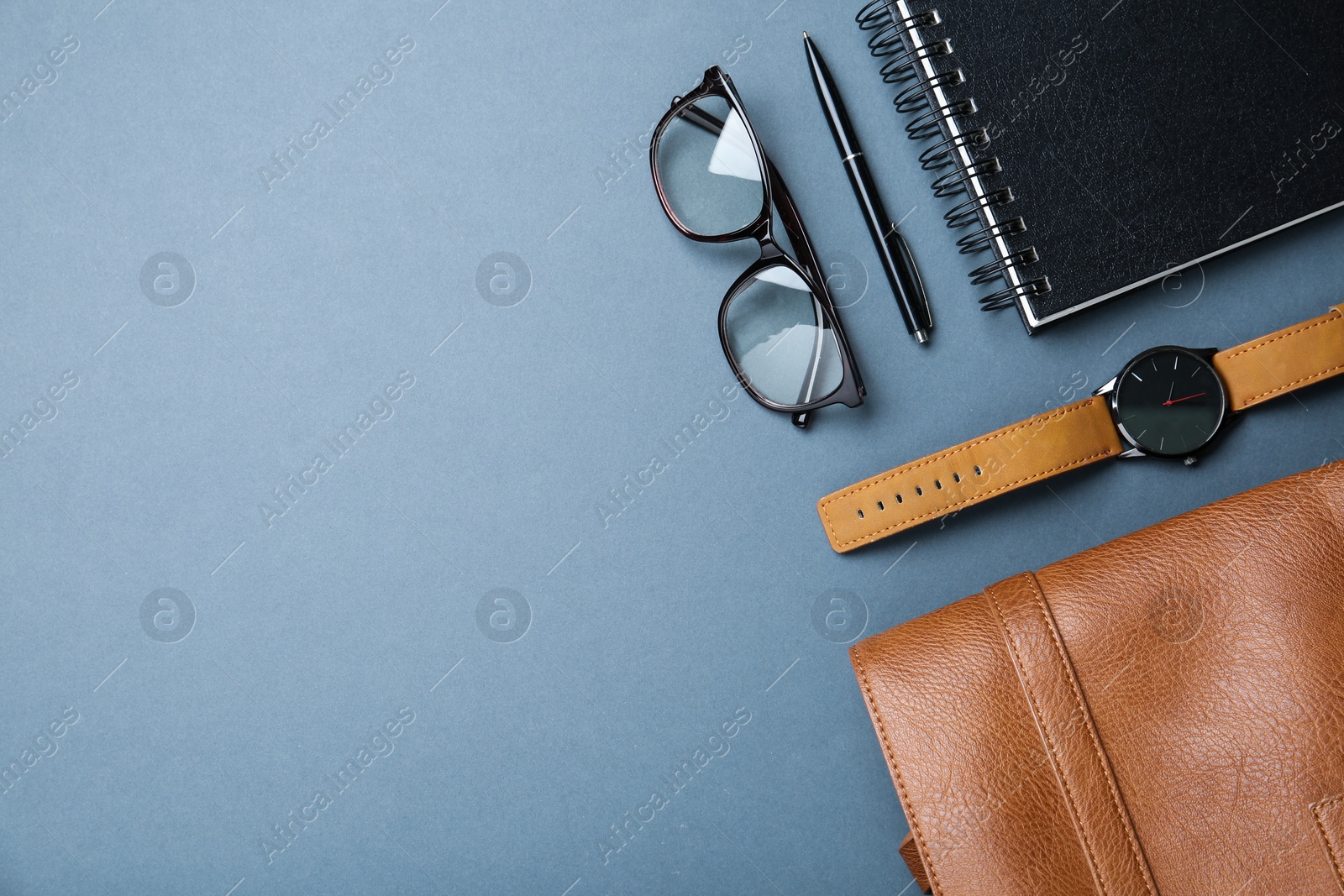 Photo of Men's accessorises on grey background, flat lay. Space for text