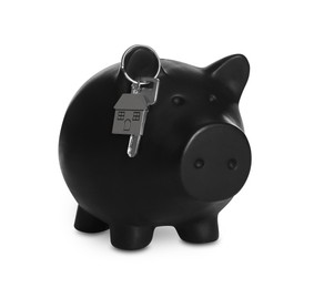 Photo of Piggy bank with key on white background. Saving money for buying house