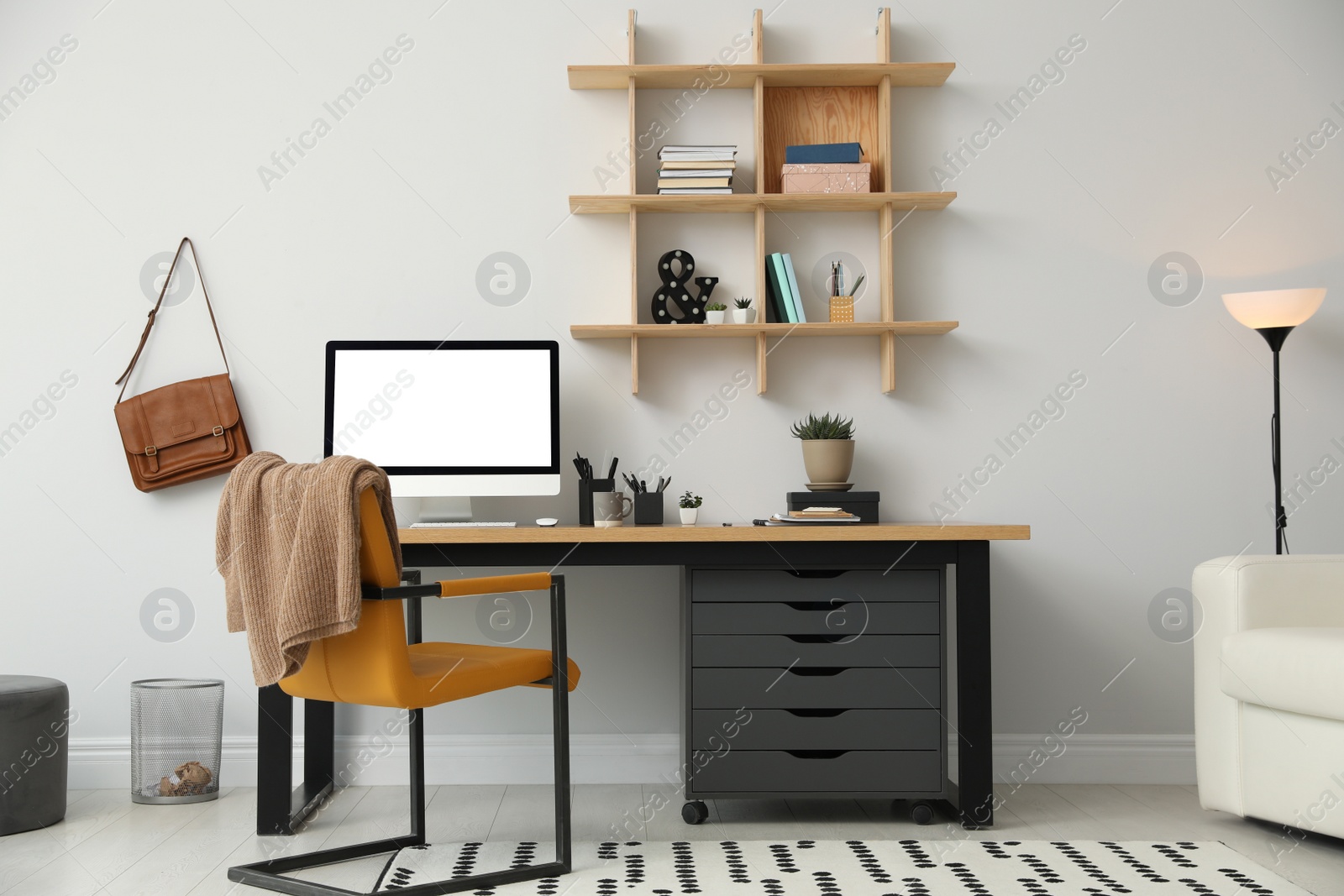 Photo of Stylish room interior with modern comfortable workplace