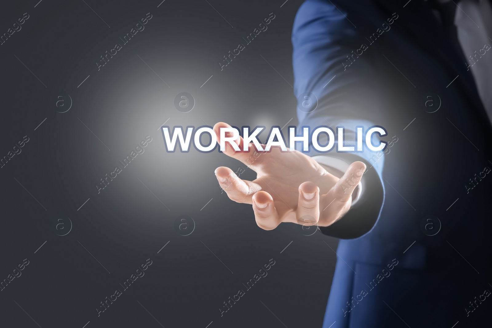 Image of Businessman and word Workaholic on dark grey background, closeup