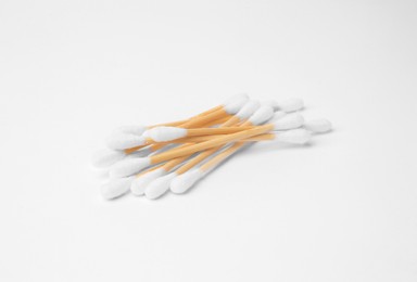 Pile of clean cotton buds isolated on white