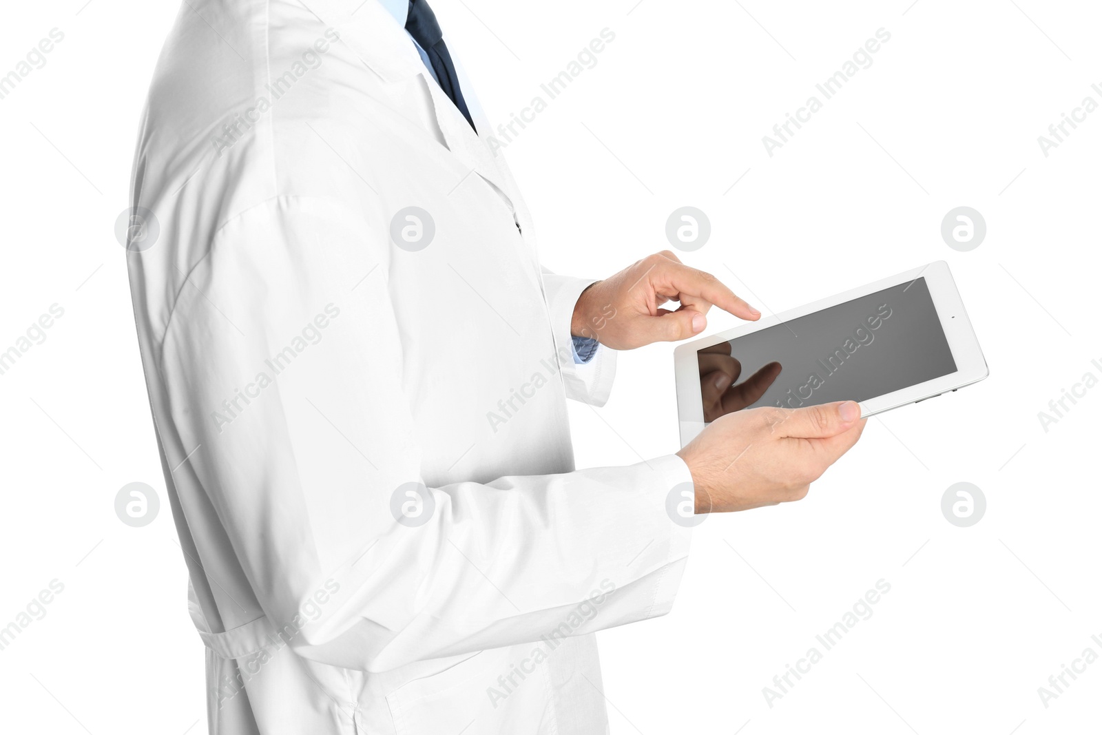 Photo of Male doctor holding modern tablet on white background, closeup