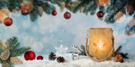 Image of Composition with wooden Christmas lantern on snow against color background, banner design. Bokeh effect
