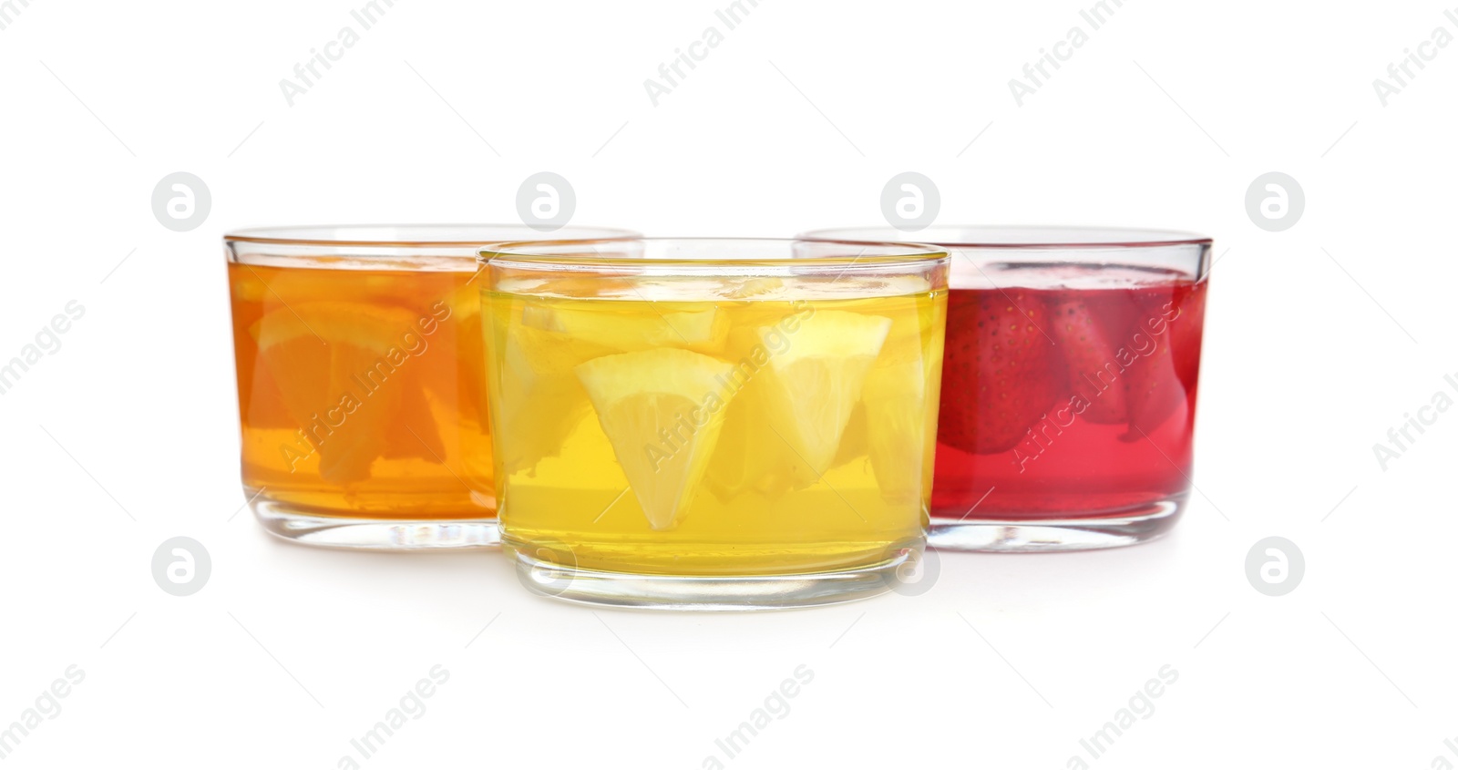 Photo of Tasty jelly desserts in glasses on white background