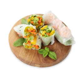 Photo of Board with tasty spring rolls isolated on white