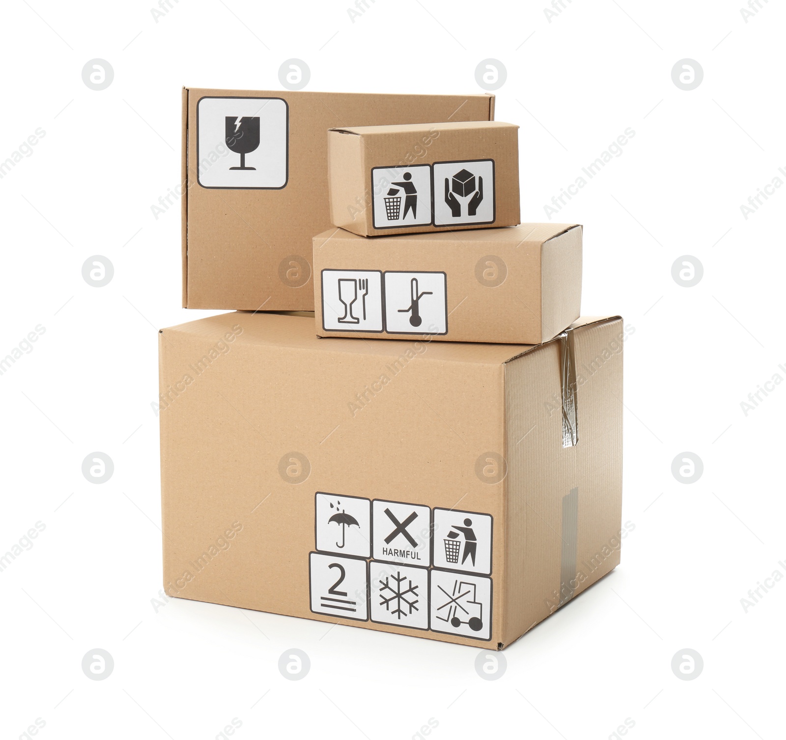 Photo of Cardboard boxes with different packaging symbols on white background. Parcel delivery