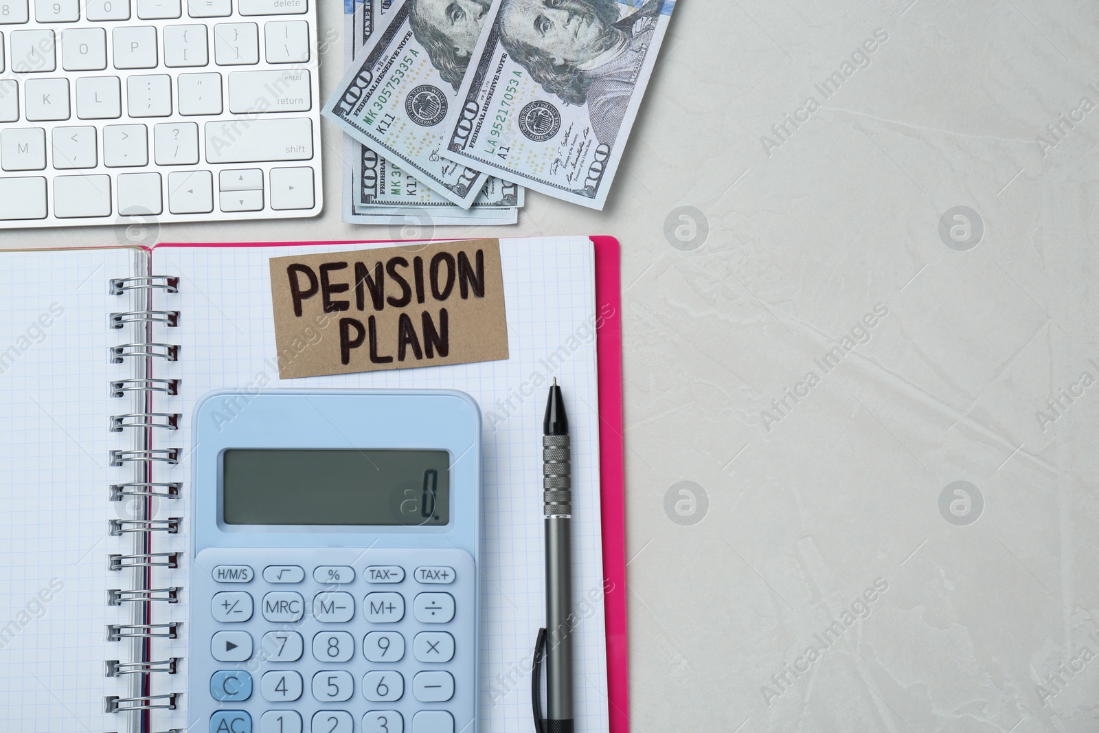 Photo of Card with words Pension Plan, banknotes, calculator and notebook on white office table, flat lay. Space for text