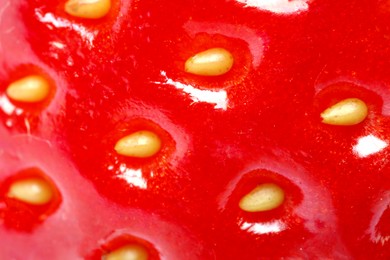 Texture of ripe strawberry as background, macro view. Fresh berry