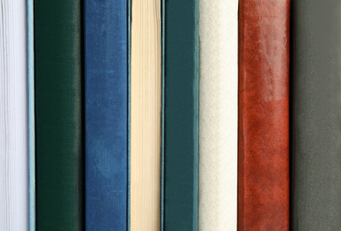 Photo of Collection of different old books as background