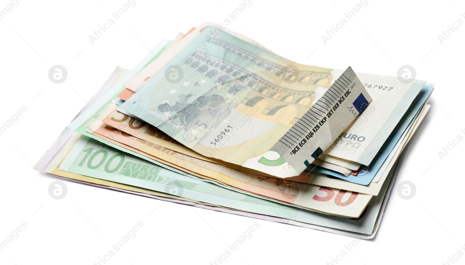 Image of Pile of different Euro banknotes on white background